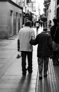 Woman walking on city street