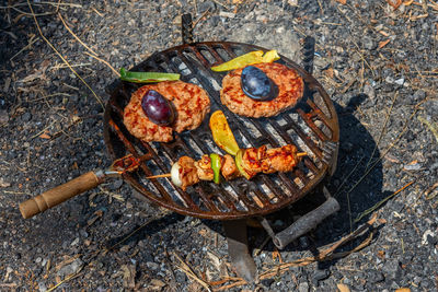 High angle view of meal on barbecue grill