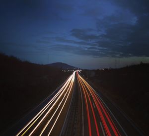 Light trails on road at night