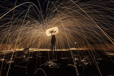 Firework display at night