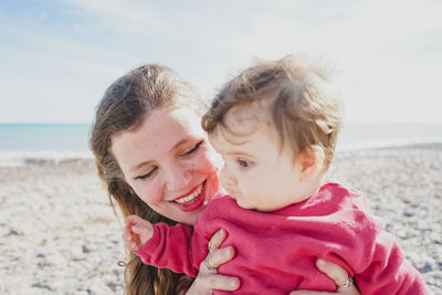 Mother and daughter at beach