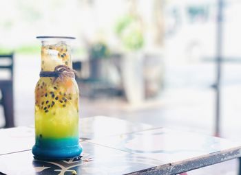 Close-up of glass of jar on table