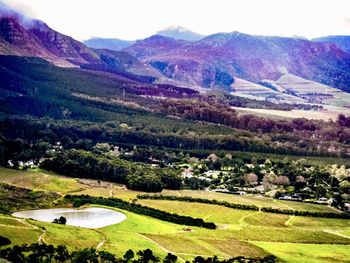 Scenic view of landscape and mountains against sky