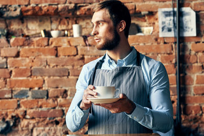 Young man drinking coffee