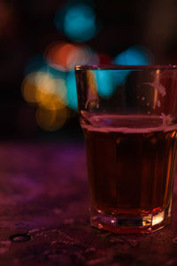 Close-up of beer glass on table