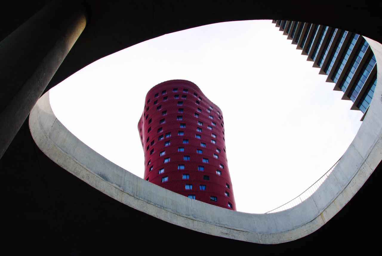 built structure, architecture, low angle view, building exterior, no people, sky, pattern, modern, building, nature, shape, day, sunlight, outdoors, close-up, geometric shape, design, circle, skyscraper, office building exterior