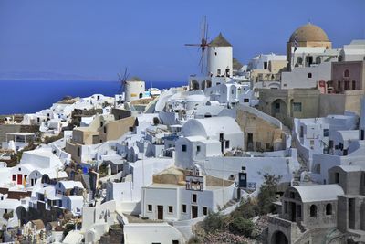 White residential district against clear blue sky