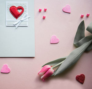 High angle view of flowers with envelope