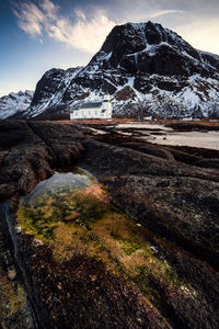 Scenic view of snowcapped mountains against sky