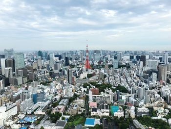 High angle view of city buildings against sky