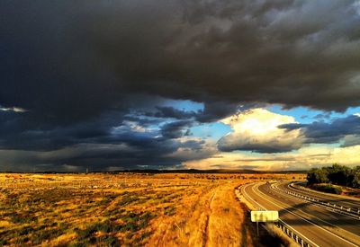 Storm clouds over field