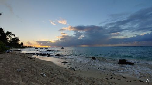 Scenic view of sea against sky during sunset