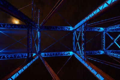 Low angle view of illuminated lights at night