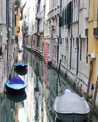 Boats moored on shore