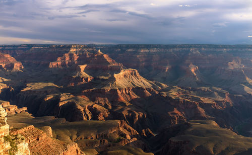 Aerial view of rock formations against sky