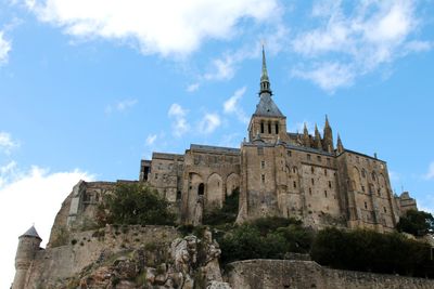 Low angle view of historic building against sky