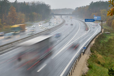 High angle view of highway amidst trees