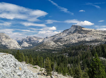 Scenic view of mountains against cloudy sky