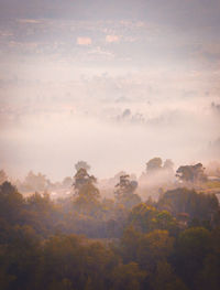 Scenic view of landscape against sky at sunset