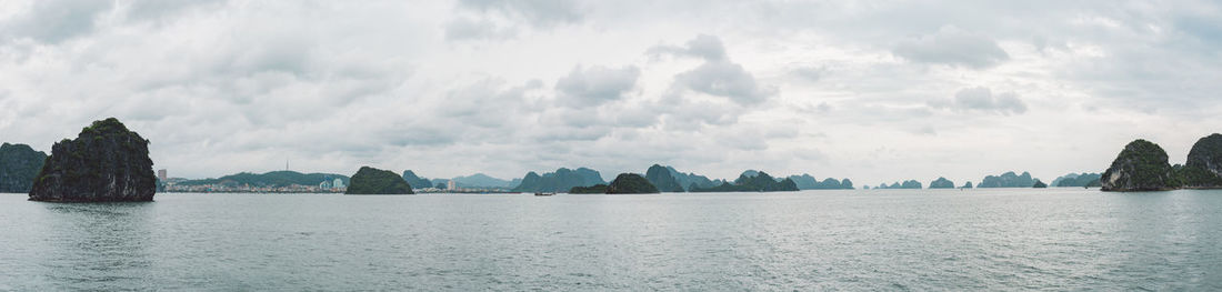 Panoramic view of sea against cloudy sky