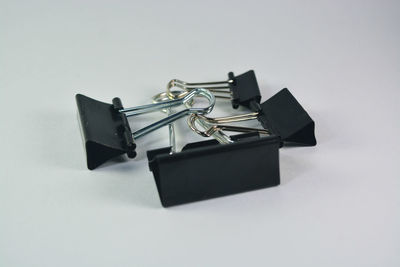 High angle view of objects on table against white background