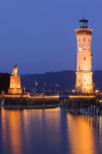 Illuminated harbor of city lindau at lake bodensee in bavaria