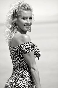 A girl in a leopard dress