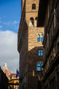 Low angle view of buildings against sky