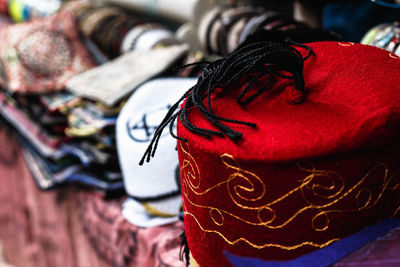 Close-up of red hat in market