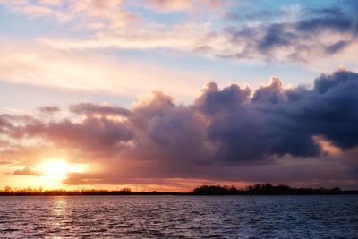 Scenic view of sea at sunset