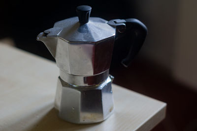 Close-up of coffee cup on table