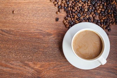 High angle view of coffee cup on table