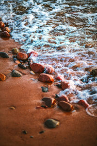 High angle view of stones on beach