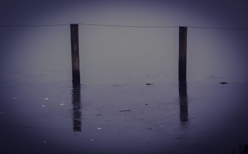 Reflection of sky in puddle
