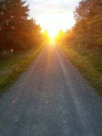 Empty road at sunset