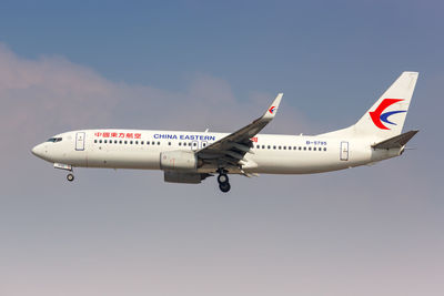 Airplane flying against clear sky