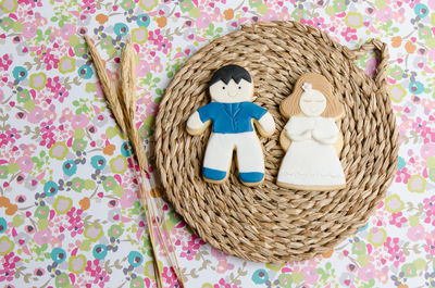 High angle view of cookies on straw placemat