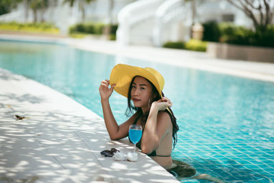 Young woman in swimming pool