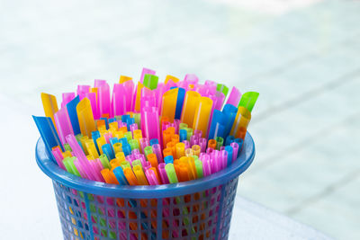 Close-up of multi colored candies in container