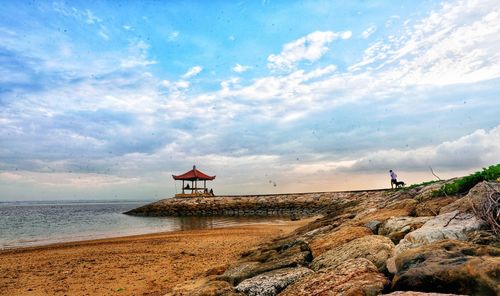 Scenic view of beach against sky