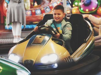 Close-up of toy car and kid