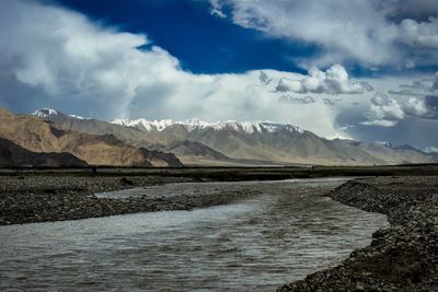 Alar national wetland park is surrounded by high mountains