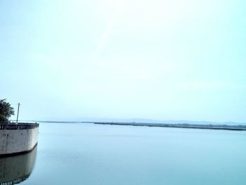 Scenic view of calm sea against sky