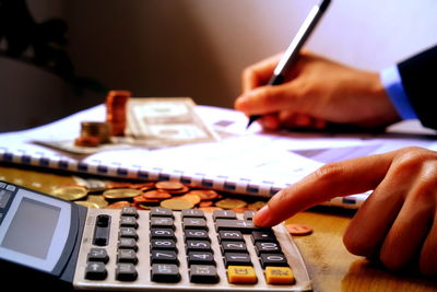 Close-up of man working on table