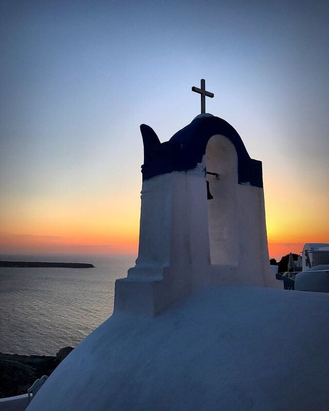 LOW ANGLE VIEW OF SILHOUETTE BELL TOWER AGAINST SKY DURING SUNSET