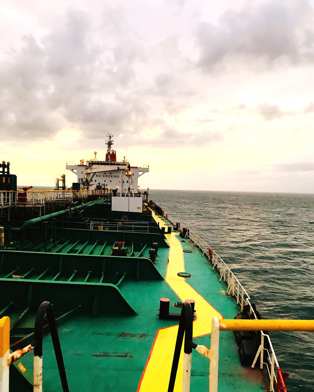 SHIP IN SEA AGAINST SKY