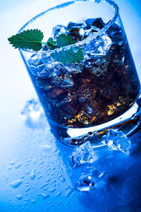 Close-up of ice cream on glass table