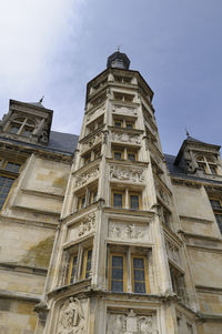 Low angle view of old building against sky