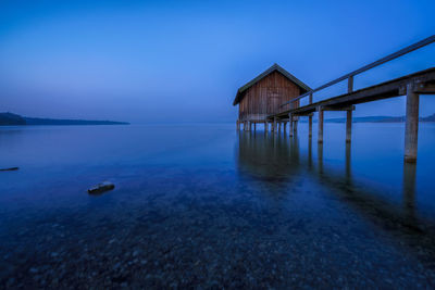 Scenic view of sea against blue sky