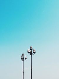 Low angle view of street light against clear sky